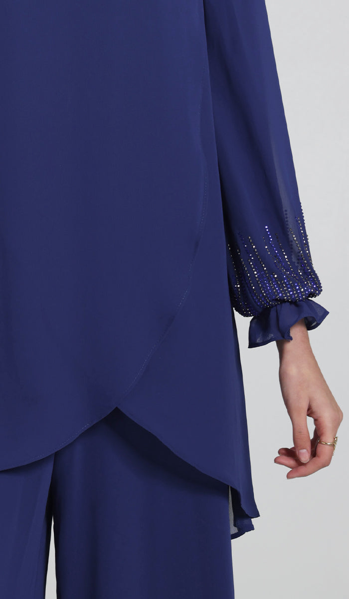 Details of embellishment of Seema tunic in Blue.