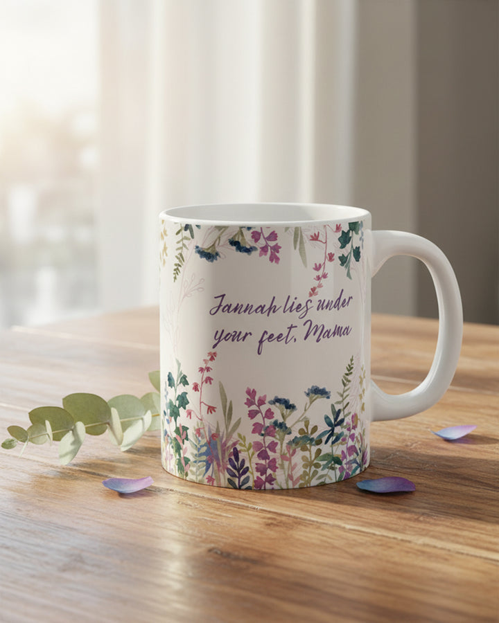 Mug with floral design and text on a wooden surface