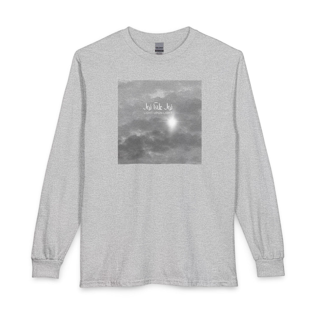 A gray heather long-sleeve crewneck t-shirt featuring a square grayscale graphic print on the chest depicting clouds and Arabic Calligraphy