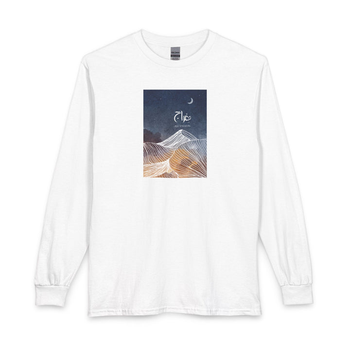 A white long-sleeve crewneck t-shirt with a rectangular graphic print on the chest. The graphic features a dark blue night sky with a crescent moon and the word 'Elko' in white script, above a stylized desert dune illustration in shades of blue, white, and gold.