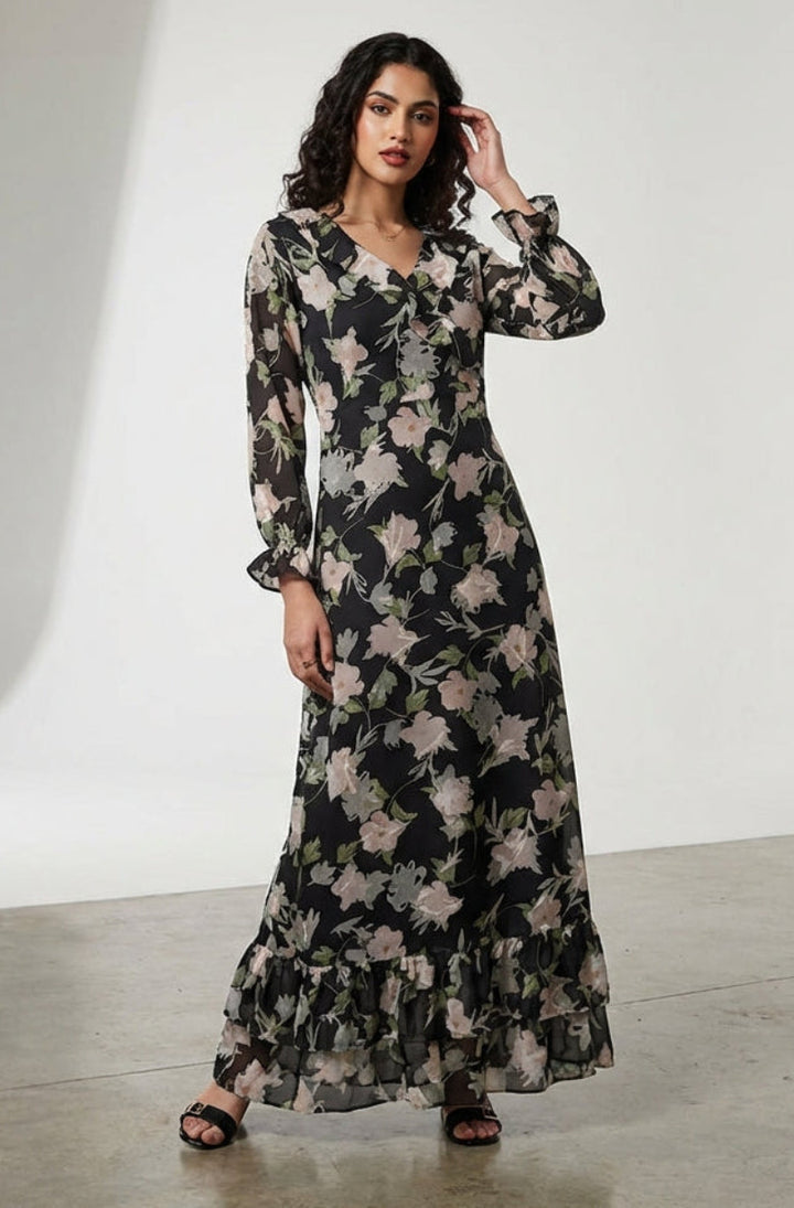 Woman wearing a floral dress in a studio setting