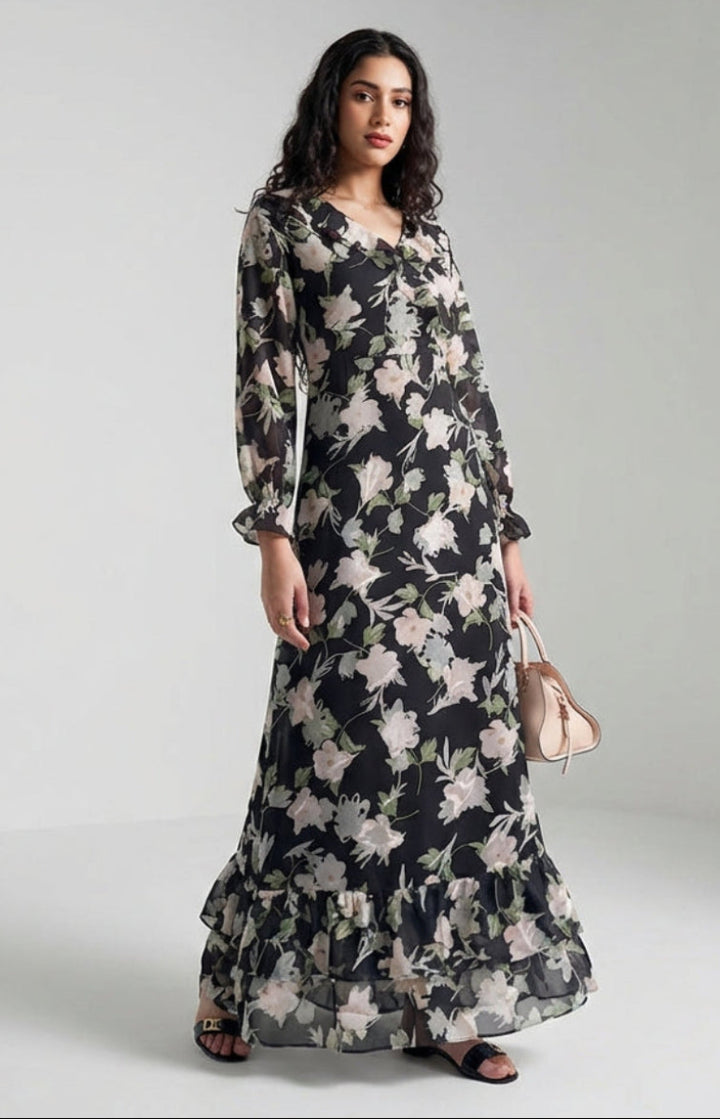 Woman wearing a floral dress on a plain background