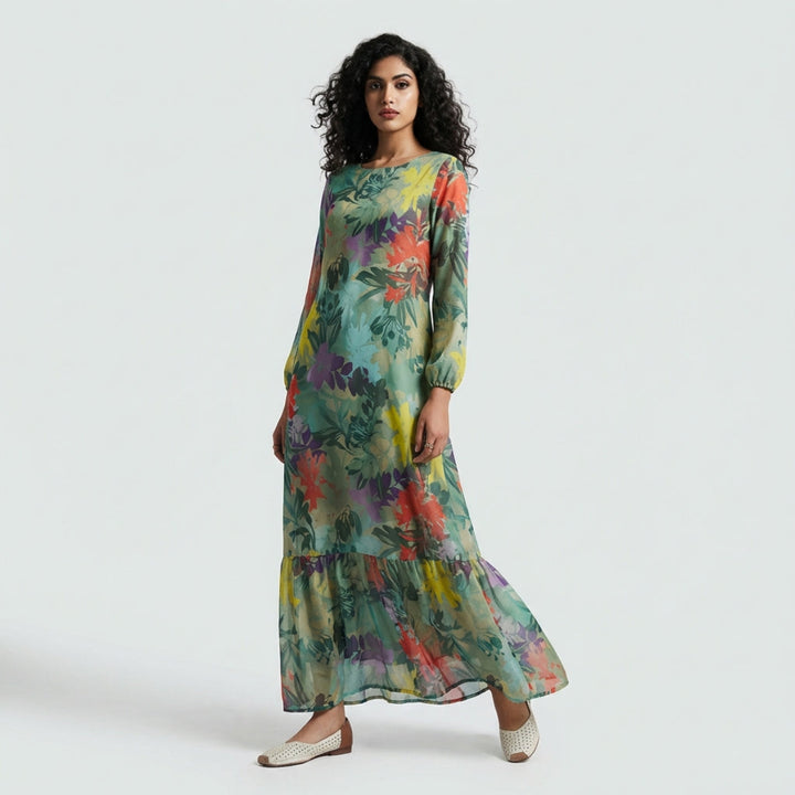 Woman wearing a colorful floral dress on a white background