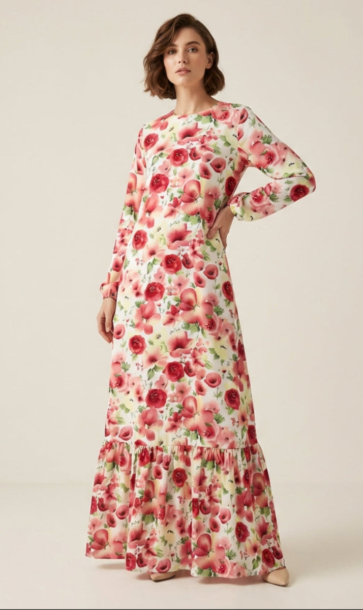 Woman wearing a floral dress on a plain background