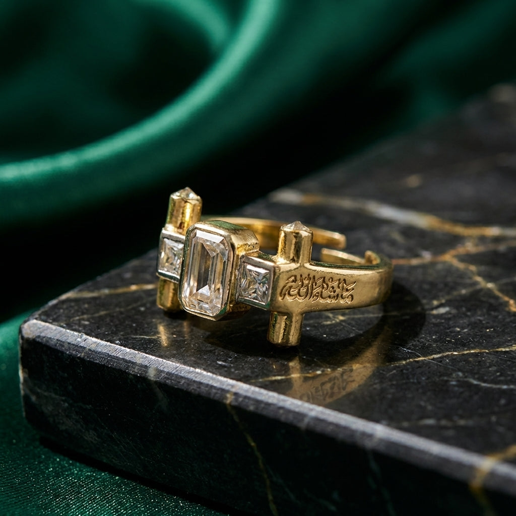 Gold ring with diamond accents on a dark marble surface
