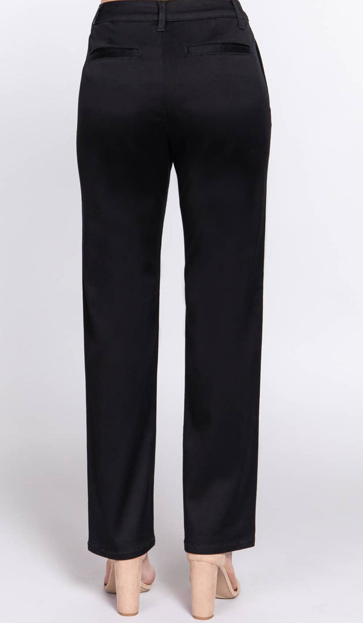 Back view of woman wearing Erem pants in Black. 