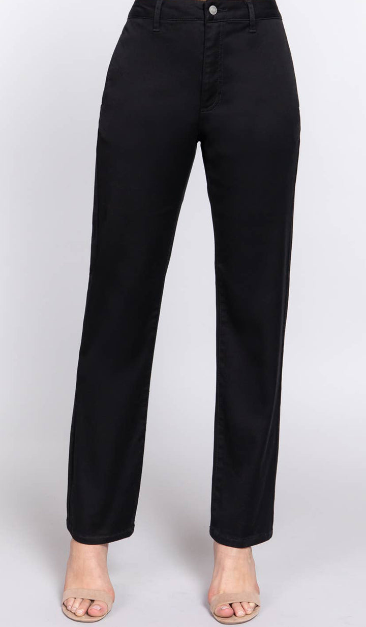 Woman wearing Erem pants in Black. 