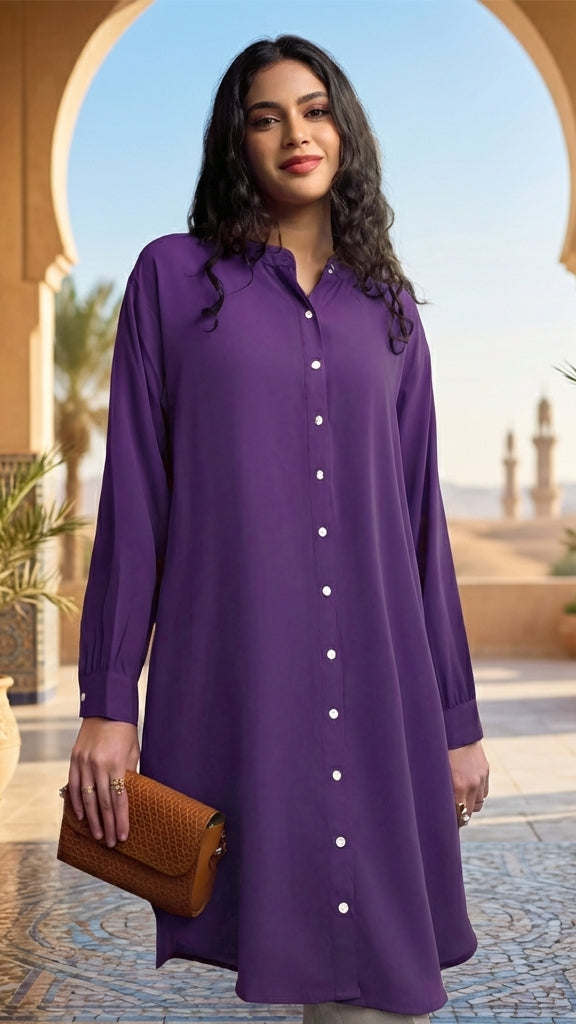 Woman in a purple dress standing in an outdoor setting with arches and plants.