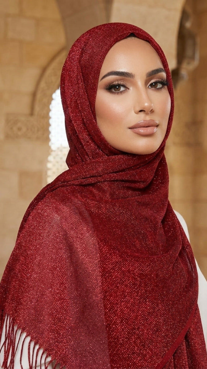Woman wearing a red hijab in an architectural setting