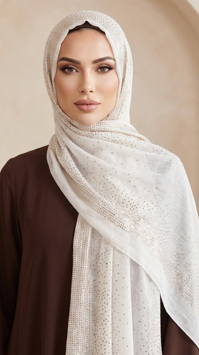 Woman wearing a white hijab with a brown background