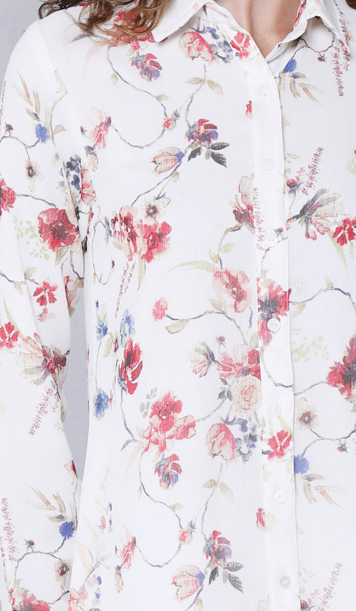 Floral patterned shirt with colorful flowers on a white background