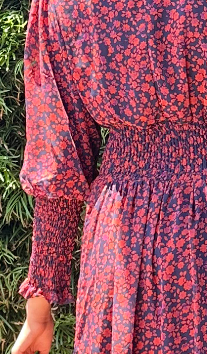 Close up ruching details of Anisa dress. 