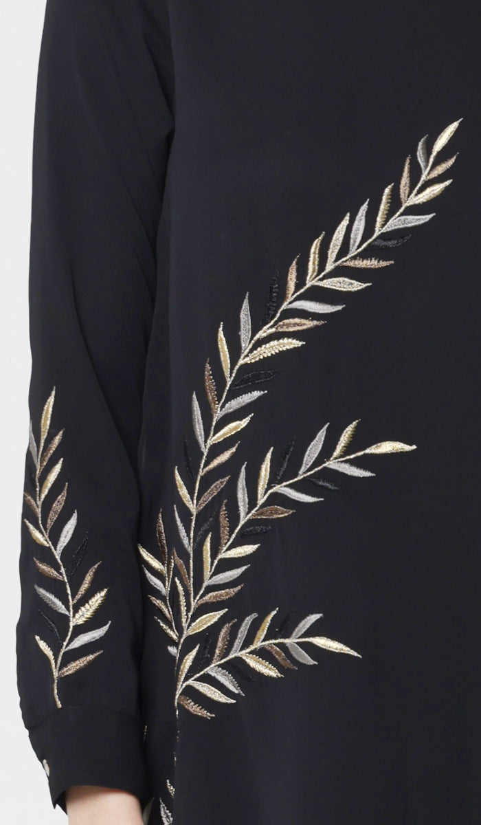 Embroidery details of Baraka tunic in Black. 