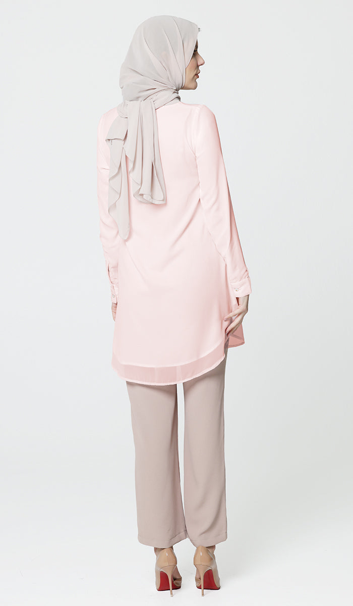 Back view of Baraka tunic in Blush Pink. 