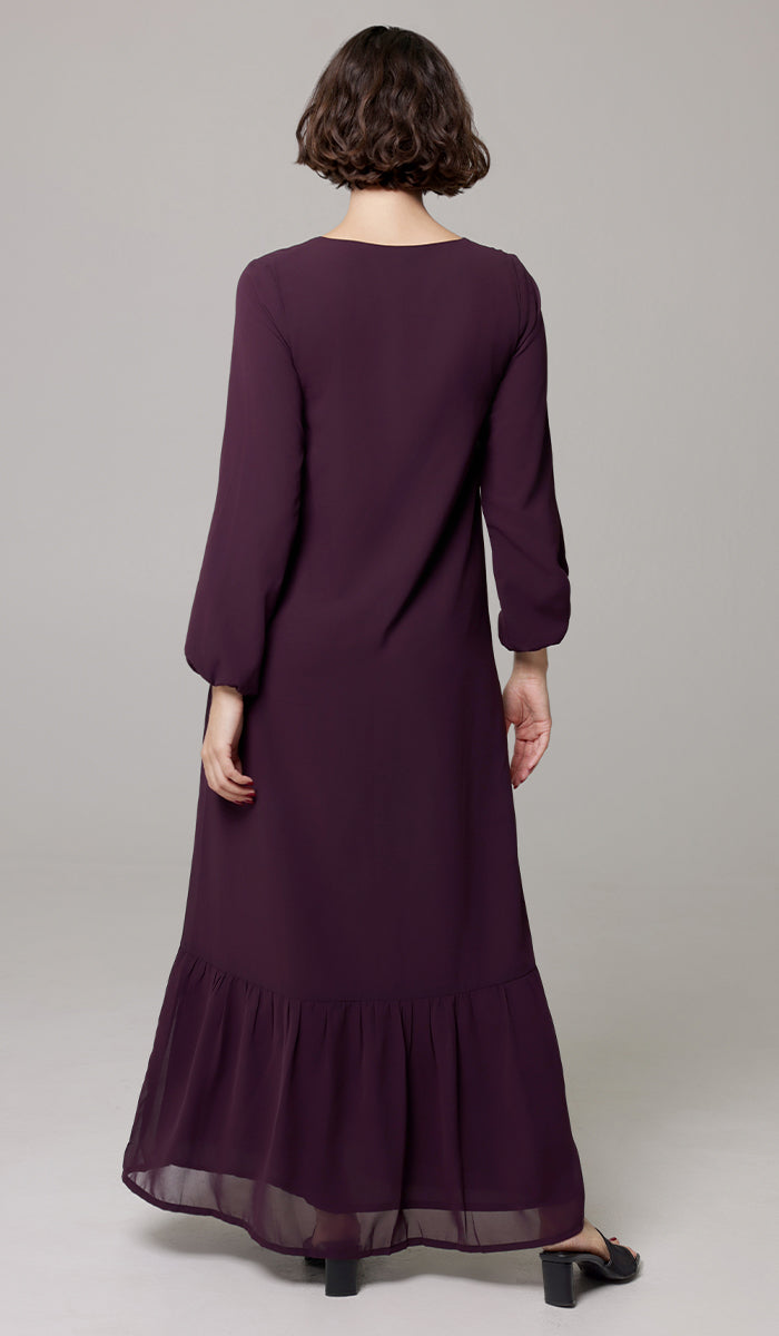 Back view of Batool dress in Mulberry. 