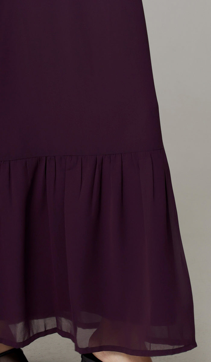 Bottom details of Batool dress in Mulberry. 