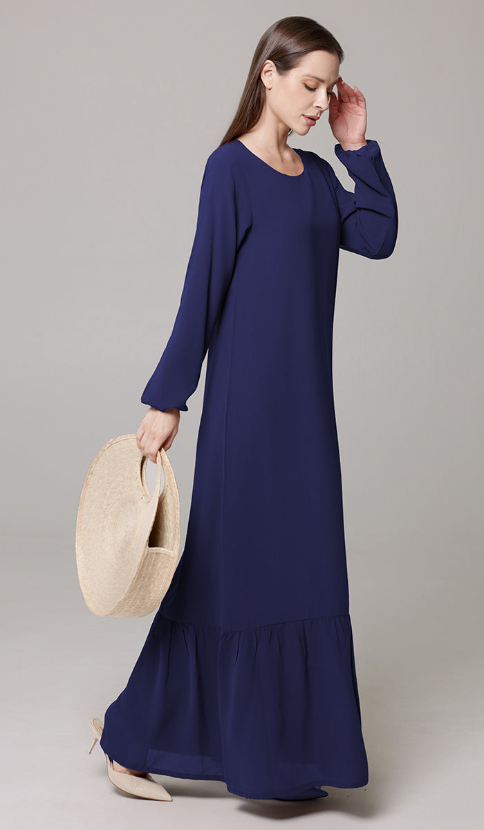 Woman wearing Batool dress in Navy Blue.