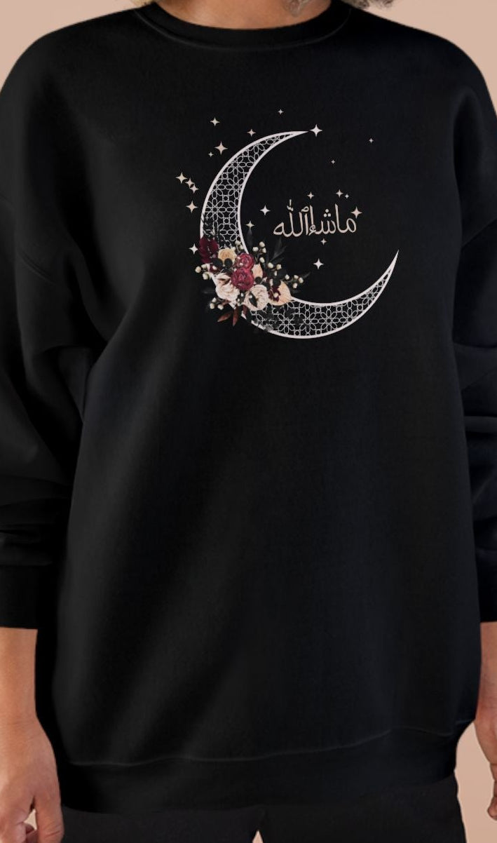 Person wearing a black sweatshirt with 'Built from Shadows' text on a beige background
