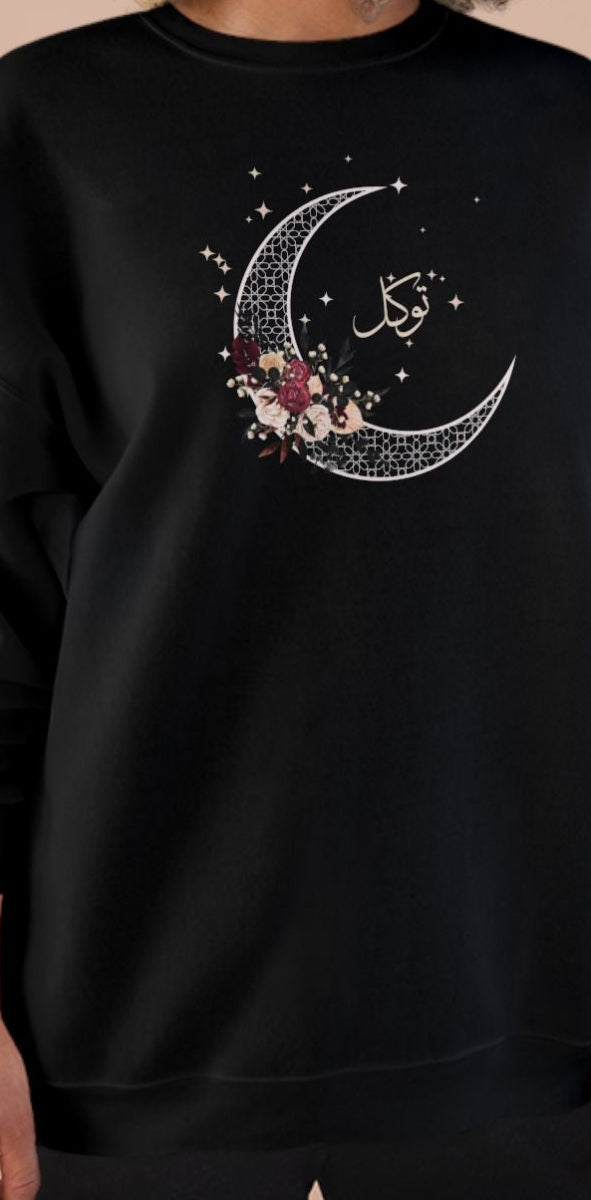 Person wearing a black sweatshirt  with text on a beige background