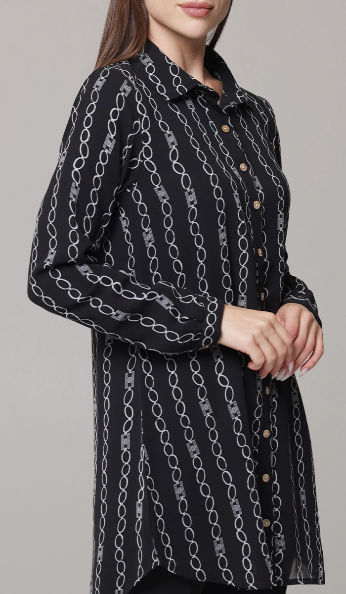 Woman wearing Marwa tunic in Black/White. 