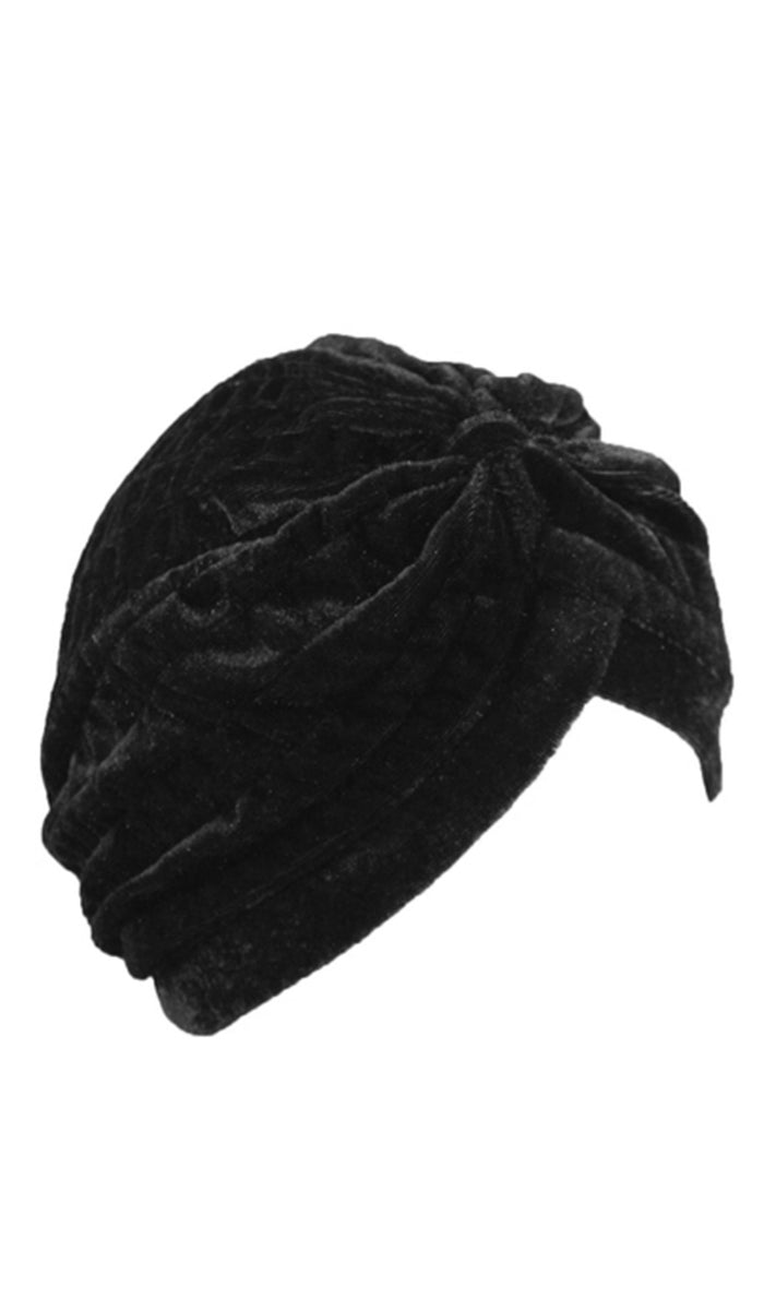 Black velvet turban on a white background