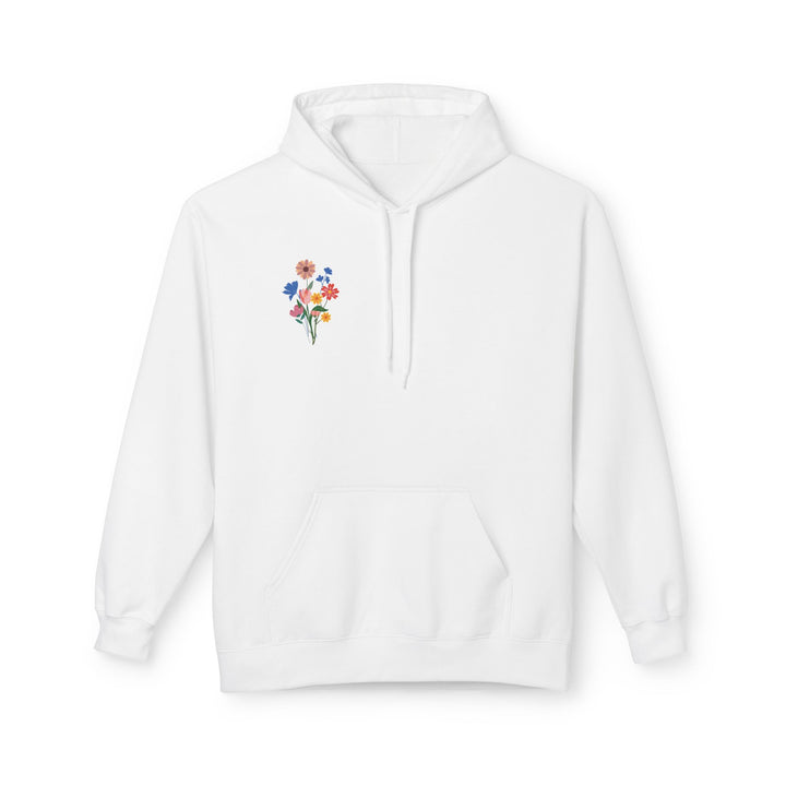 A purple hoodie with a floral pattern and Arabic calligraphy on the back.