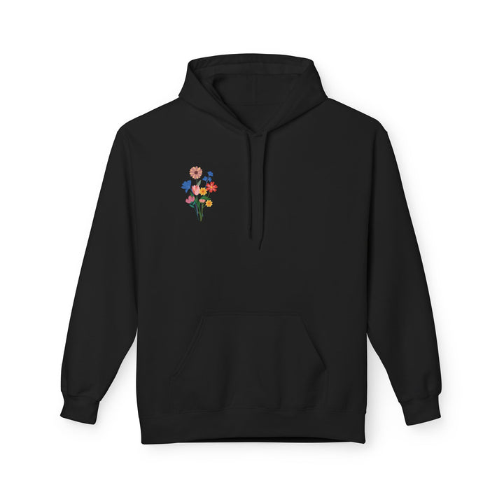 A purple hoodie with a floral pattern and Arabic calligraphy on the back.