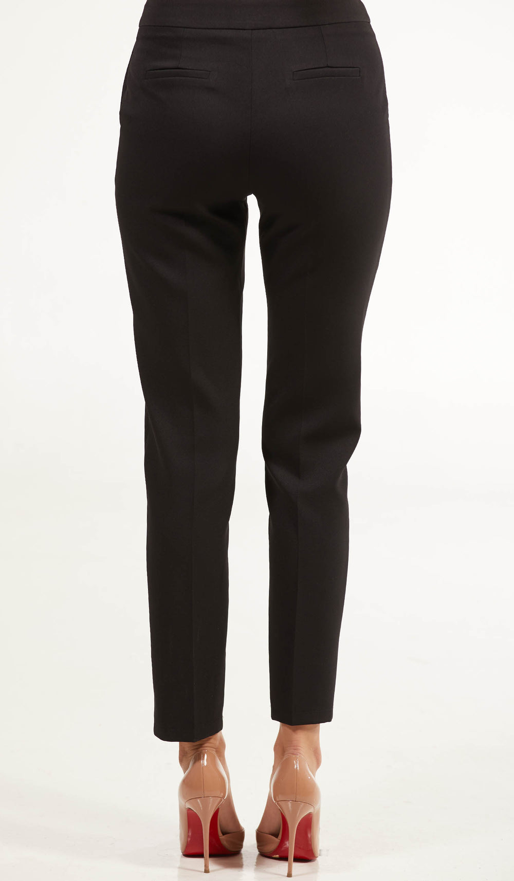 Back view of woman wearing Alma Tailored Stretch Cigarette Pants in Black with heels. 