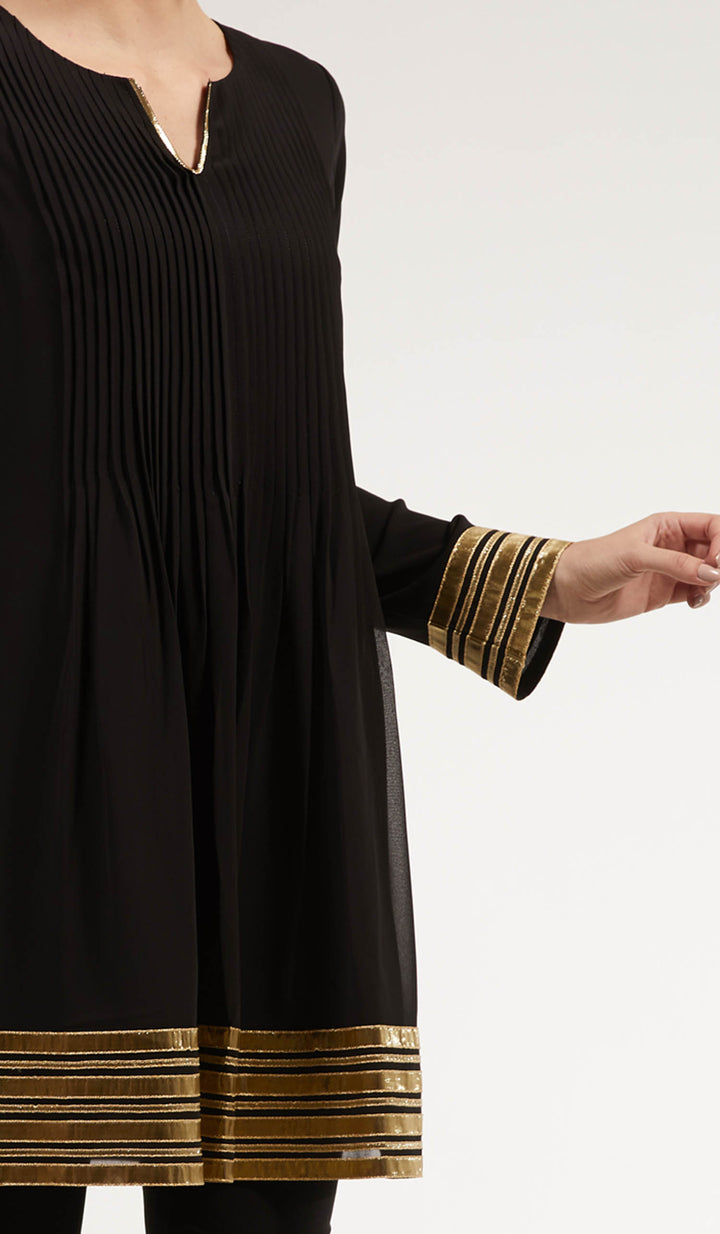 Sleeve and embellishment details of the Sultana tunic in Black. 