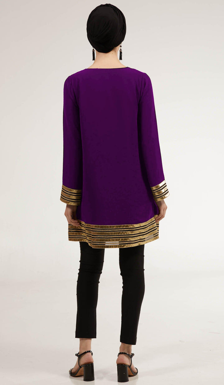 Back view of woman wearing modest Sultana tunic in Deep Plum. 