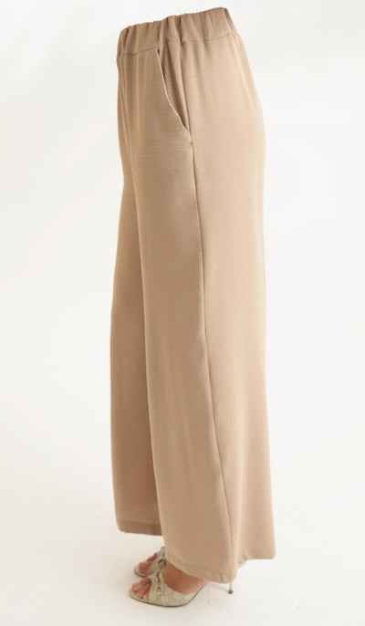 Ilham Loose Flowy Stretch Palazzo Pants - Tan
